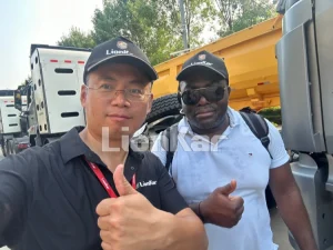 african-client-inspects-howo-trucks-01